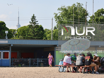 People are picnicking on Centre Island in Toronto, Ontario, Canada, on July 13, 2024. (