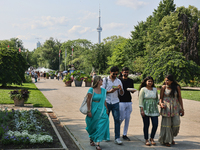 The CN Tower is appearing above the treetops from Centre Island in Toronto, Ontario, Canada, on July 13, 2024. (