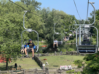 People are enjoying the skyride on Centre Island in Toronto, Ontario, Canada, on July 13, 2024. (