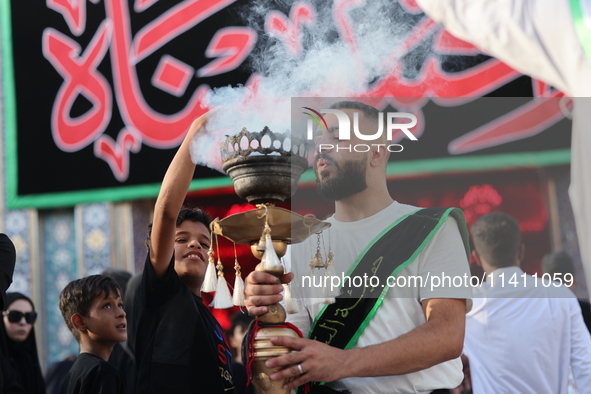 Muslims Pay Their Respects In Karbala, Iraq, on july 15, 2024.  Ashura Is A Period Of Mourning In Remembrance Of The Seventh - Century Marty...