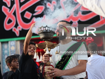 Muslims Pay Their Respects In Karbala, Iraq, on july 15, 2024.  Ashura Is A Period Of Mourning In Remembrance Of The Seventh - Century Marty...