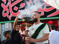 Muslims Pay Their Respects In Karbala, Iraq, on july 15, 2024.  Ashura Is A Period Of Mourning In Remembrance Of The Seventh - Century Marty...