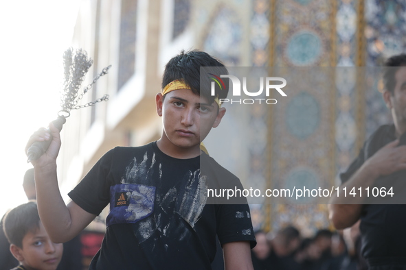 Muslims Pay Their Respects In Karbala, Iraq, on july 15, 2024.  Ashura Is A Period Of Mourning In Remembrance Of The Seventh - Century Marty...