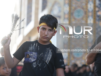 Muslims Pay Their Respects In Karbala, Iraq, on july 15, 2024.  Ashura Is A Period Of Mourning In Remembrance Of The Seventh - Century Marty...