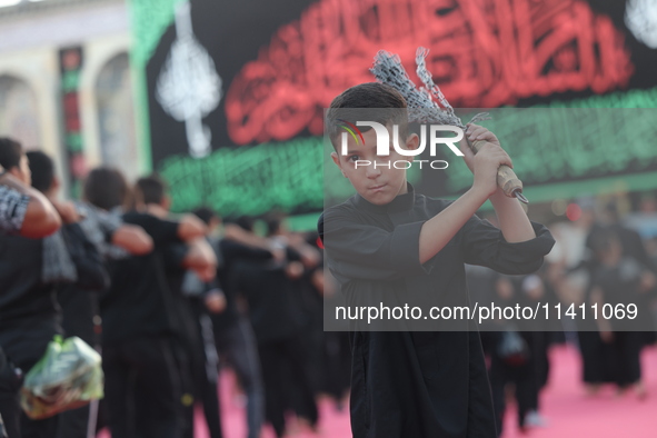 Muslims Pay Their Respects In Karbala, Iraq, on july 15, 2024.  Ashura Is A Period Of Mourning In Remembrance Of The Seventh - Century Marty...