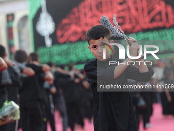 Muslims Pay Their Respects In Karbala, Iraq, on july 15, 2024.  Ashura Is A Period Of Mourning In Remembrance Of The Seventh - Century Marty...