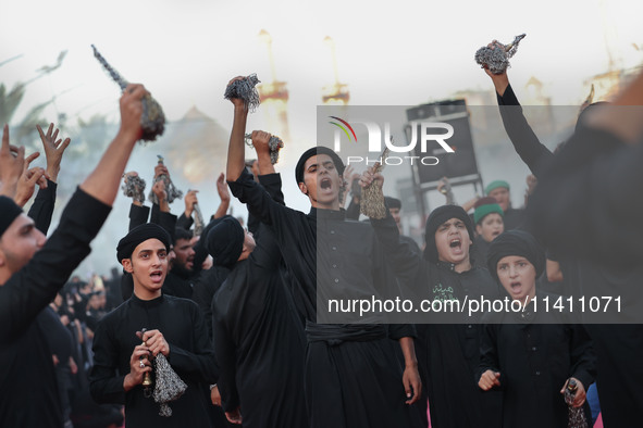 Muslims Pay Their Respects In Karbala, Iraq, on july 15, 2024.  Ashura Is A Period Of Mourning In Remembrance Of The Seventh - Century Marty...