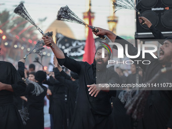 Muslims Pay Their Respects In Karbala, Iraq, on july 15, 2024.  Ashura Is A Period Of Mourning In Remembrance Of The Seventh - Century Marty...