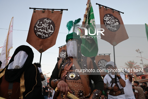 Muslims Pay Their Respects In Karbala, Iraq, on july 15, 2024.  Ashura Is A Period Of Mourning In Remembrance Of The Seventh - Century Marty...