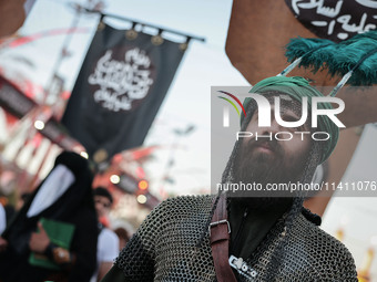 Muslims Pay Their Respects In Karbala, Iraq, on july 15, 2024.  Ashura Is A Period Of Mourning In Remembrance Of The Seventh - Century Marty...