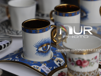 Decorative cups for Arabic style coffee are being sold during the Taste of the Middle East Food Festival in Toronto, Ontario, Canada, on Jul...