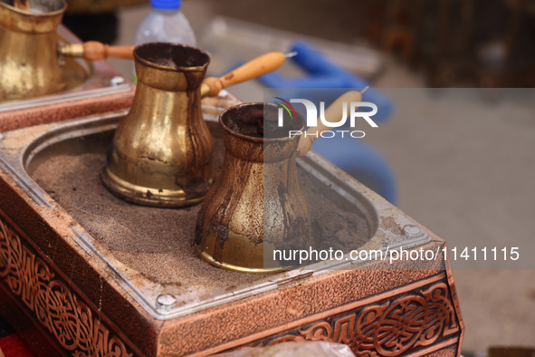 Traditional Turkish coffee is being prepared during the Taste of the Middle East Food Festival in Toronto, Ontario, Canada, on July 06, 2024...