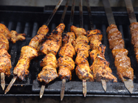 Syrian Aleppo style kabobs are grilling during the Taste of the Middle East Food Festival in Toronto, Ontario, Canada, on July 06, 2024. The...