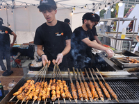 A man is grilling Syrian Aleppo-style kabobs during the Taste of the Middle East Food Festival in Toronto, Ontario, Canada, on July 06, 2024...