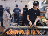 A man is grilling Syrian Aleppo-style kabobs during the Taste of the Middle East Food Festival in Toronto, Ontario, Canada, on July 06, 2024...