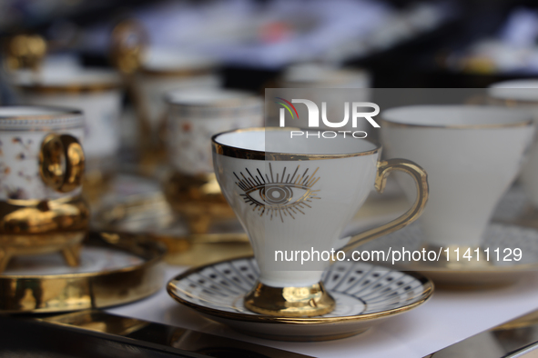 Decorative cups for Arabic style coffee are being sold during the Taste of the Middle East Food Festival in Toronto, Ontario, Canada, on Jul...