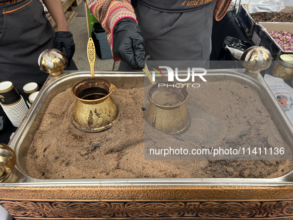 Traditional Turkish coffee is being prepared during the Taste of the Middle East Food Festival in Toronto, Ontario, Canada, on July 06, 2024...