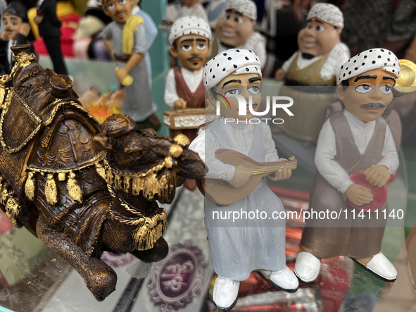 Arab figures are being sold during the Taste of the Middle East Food Festival in Toronto, Ontario, Canada, on July 06, 2024. The festival is...