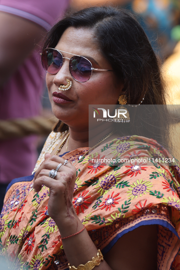 Thousands of Hindu devotees are taking part in the procession during the annual Rath Yatra festival in Toronto, Ontario, Canada, on July 13,...