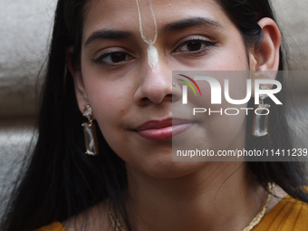 Thousands of Hindu devotees are taking part in the procession during the annual Rath Yatra festival in Toronto, Ontario, Canada, on July 13,...