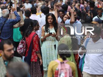 Thousands of Hindu devotees are taking part in the procession during the annual Rath Yatra festival in Toronto, Ontario, Canada, on July 13,...