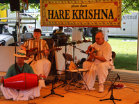 Hindu devotees are singing kirtans during the annual Rath Yatra festival in Toronto, Ontario, Canada, on July 13, 2024. The Rath Yatra festi...