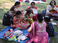 Hindu devotees are picnicking on Centre Island during the annual Rath Yatra festival in Toronto, Ontario, Canada, on July 13, 2024. The Rath...