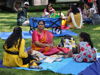 Hindu devotees are picnicking on Centre Island during the annual Rath Yatra festival in Toronto, Ontario, Canada, on July 13, 2024. The Rath...