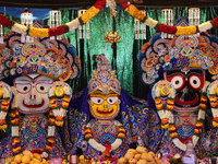 Idols of Goddesses Subhadra, Balabhadra, and Lord Jagannath are being decorated during the annual Rath Yatra festival in Toronto, Ontario, C...