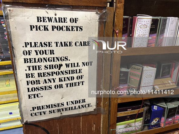 A sign is warning of pickpockets at a shop in Nainital, Uttarakhand, India, on April 21, 2024. 