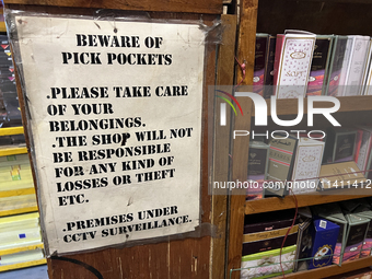 A sign is warning of pickpockets at a shop in Nainital, Uttarakhand, India, on April 21, 2024. (