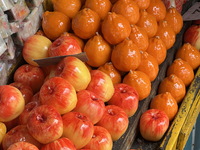 Fancy candles in the shape of fruit are being displayed at a small shop in Nainital, Uttarakhand, India, on April 21, 2024. (