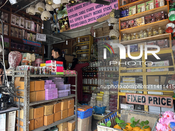 A shop is selling fancy candles in Nainital, Uttarakhand, India, on April 21, 2024. (