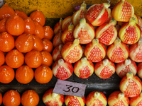 Fancy candles in the shape of fruit are being displayed at a small shop in Nainital, Uttarakhand, India, on April 21, 2024. (