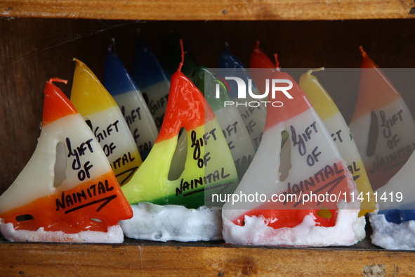 Fancy candles are being displayed at a small shop in Nainital, Uttarakhand, India, on April 21, 2024. 