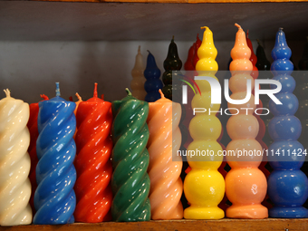 Candles are being displayed at a small shop in Nainital, Uttarakhand, India, on April 21, 2024. (