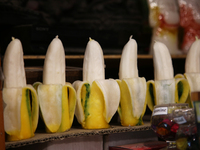 Fancy candles in the shape of bananas are being displayed at a small shop in Nainital, Uttarakhand, India, on April 21, 2024. (