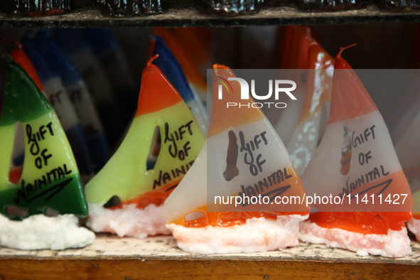 Fancy candles are being displayed at a small shop in Nainital, Uttarakhand, India, on April 21, 2024. 