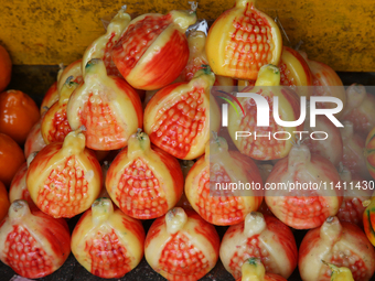 Fancy candles in the shape of fruit are being displayed at a small shop in Nainital, Uttarakhand, India, on April 21, 2024. (