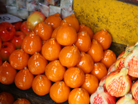 Fancy candles in the shape of fruit are being displayed at a small shop in Nainital, Uttarakhand, India, on April 21, 2024. (