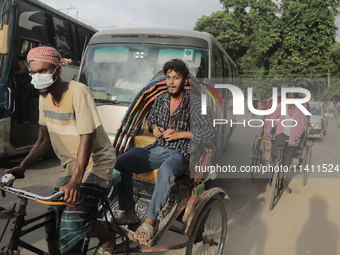 An unidentified student is rushing to the hospital as he is injured during a clash between BCL members and Quota Student Protesters in Dhaka...