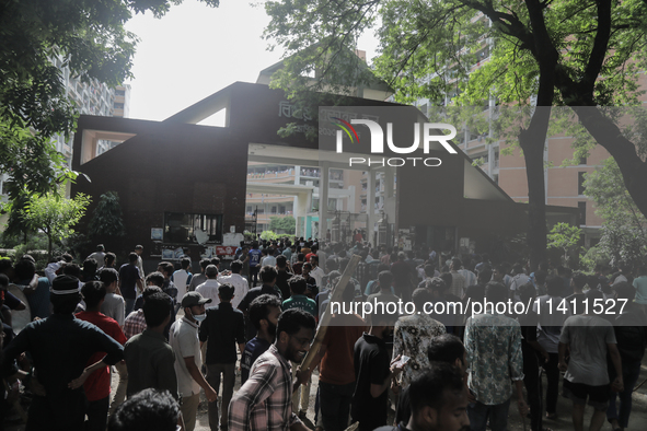 Quota student protestors are entering a dormitory of Dhaka University during a clash with BCL members in Dhaka, Bangladesh, on July 15, 2024...