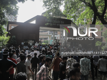 Quota student protestors are entering a dormitory of Dhaka University during a clash with BCL members in Dhaka, Bangladesh, on July 15, 2024...