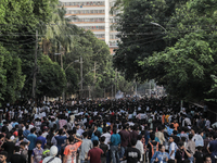 Smoke is rising after a crude bomb is exploding during a clash between BCL and student protestors in Dhaka, Bangladesh, on July 15, 2024. (