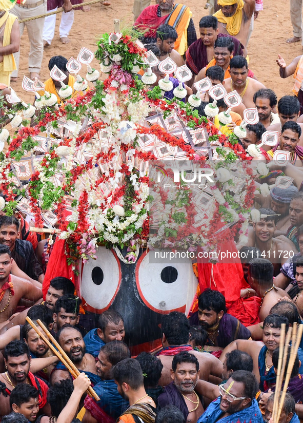 God Of The Universe Lord Jagannath Is Seen On The Grand Procession As He Comes Out From The Gundicha Temple To Ride His Chariot To Returns B...