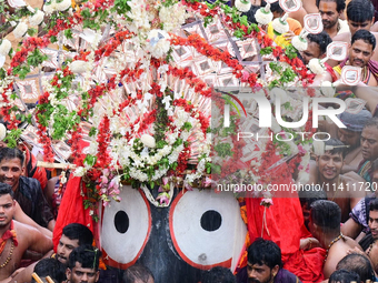 God Of The Universe Lord Jagannath Is Seen On The Grand Procession As He Comes Out From The Gundicha Temple To Ride His Chariot To Returns B...