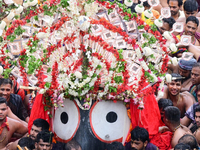 God Of The Universe Lord Jagannath Is Seen On The Grand Procession As He Comes Out From The Gundicha Temple To Ride His Chariot To Returns B...