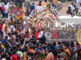 God Of The Universe Lord Jagannath Is Seen On The Grand Procession As He Comes Out From The Gundicha Temple To Ride His Chariot To Returns B...