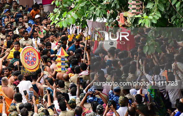 God Of The Universe Lord Jagannath Is Seen On The Grand Procession As He Comes Out From The Gundicha Temple To Ride His Chariot To Returns B...