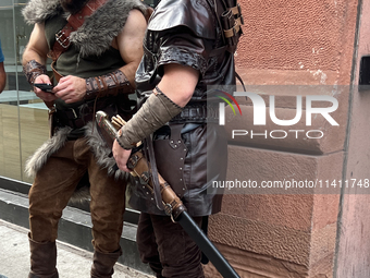 Men are dressing in Viking-style outfits in downtown, Toronto, Ontario, Canada, on July 13, 2024. (